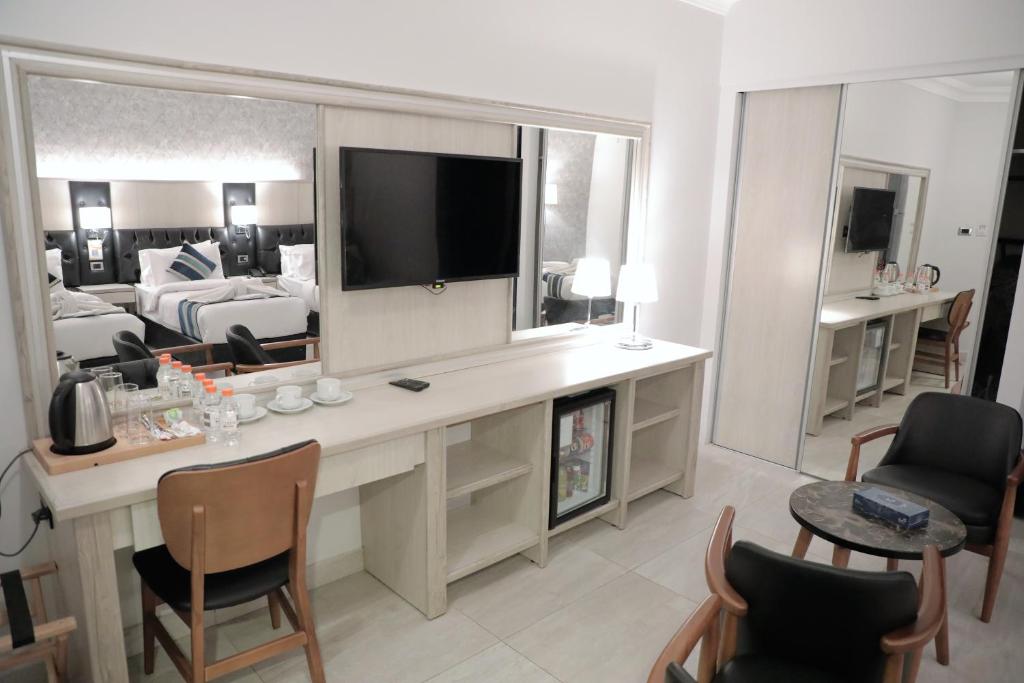 Deluxe Triple Room — photo 6