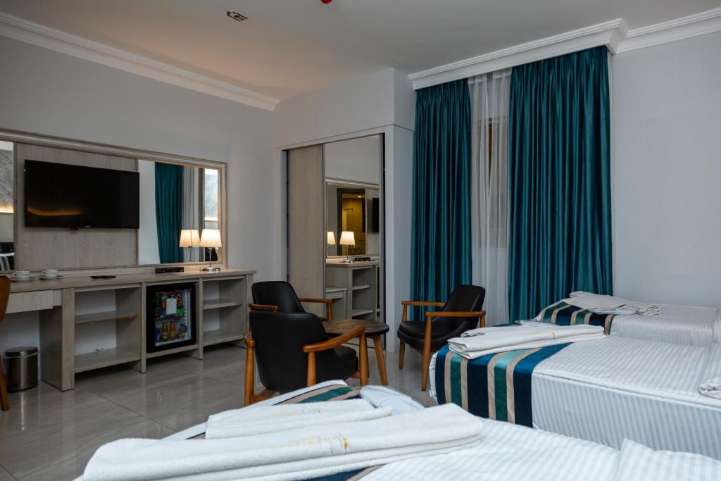 Deluxe Triple Room — photo 7